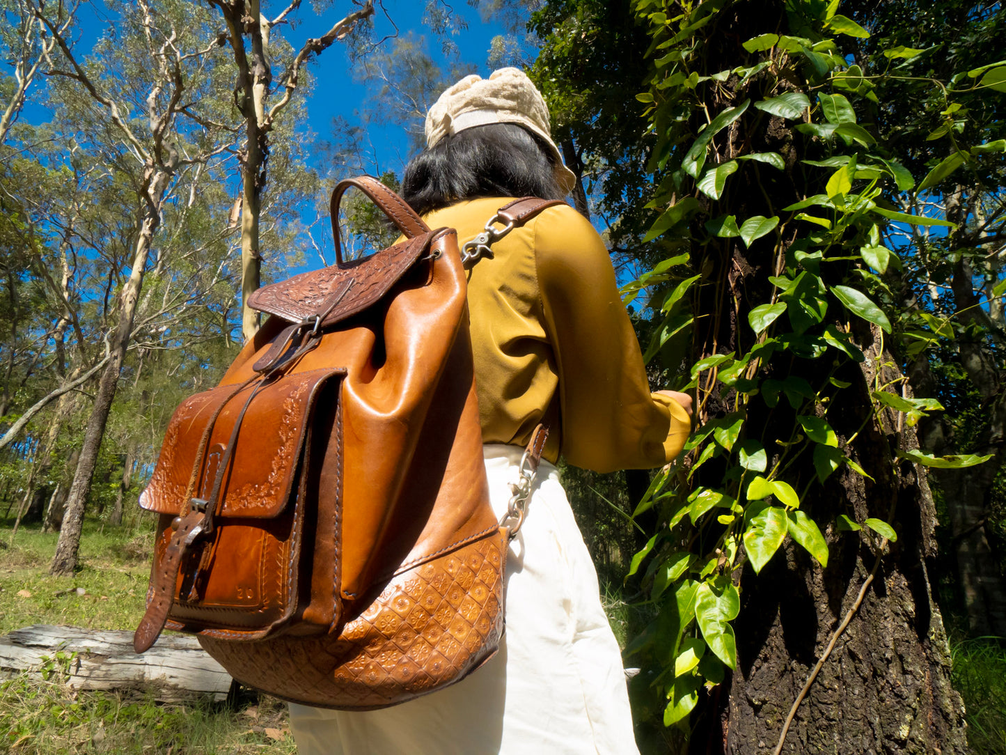 Hand embossed full leather backpack