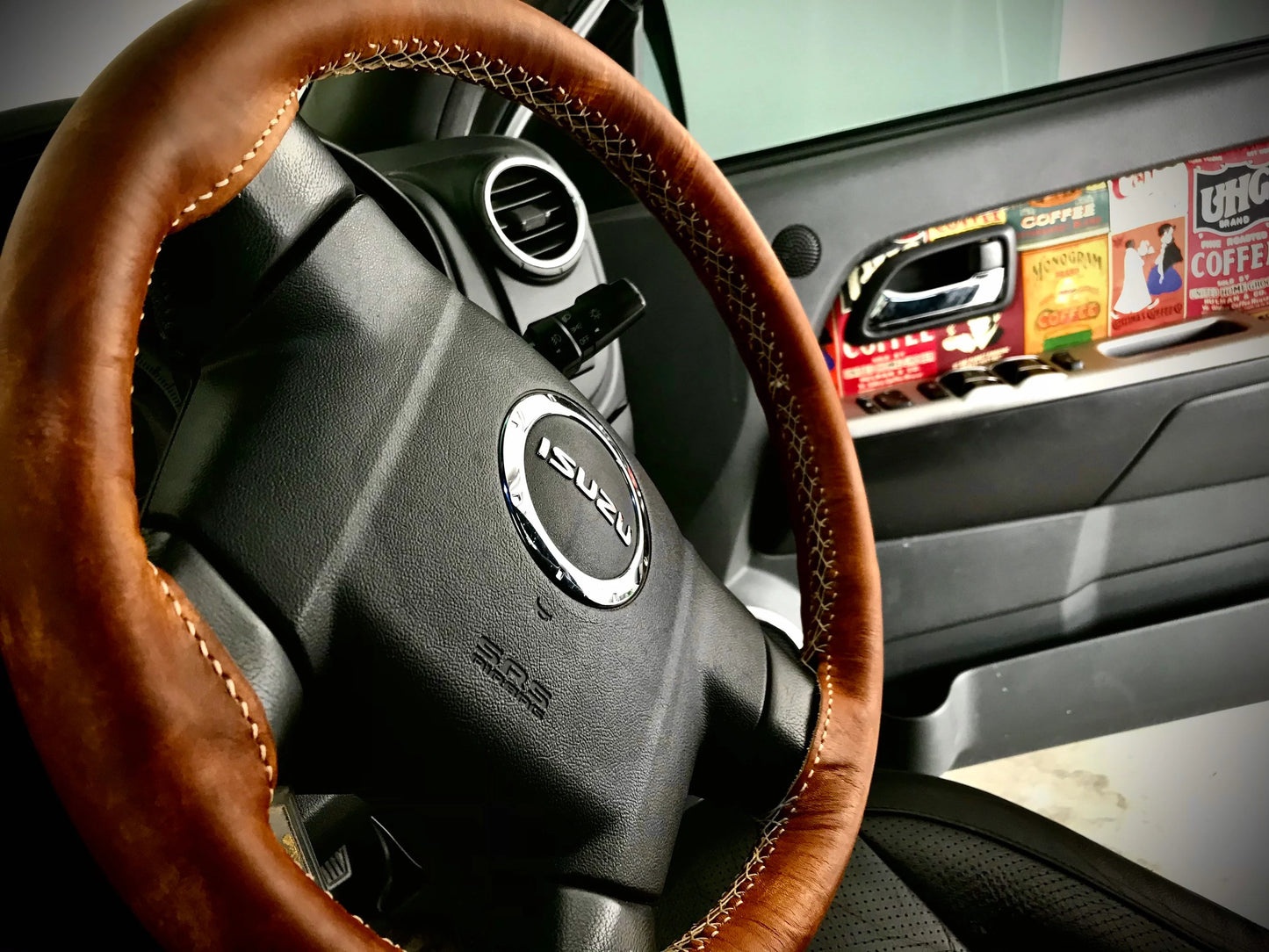 Hand crafted leather steering wheel cover