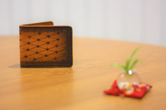 Hand tooled leather bi-fold wallet