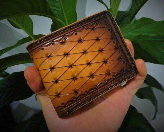 Hand tooled leather bi-fold wallet