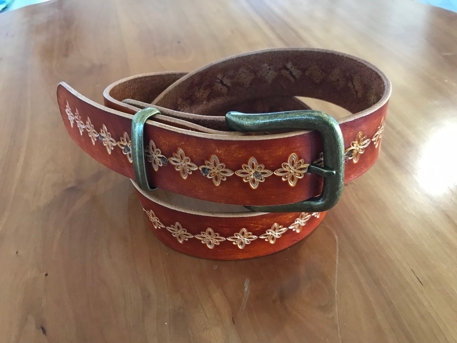 Hand tooled leather belt by The Sho Room